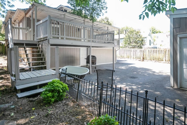 712 W Main St, Franklin, TN 37064 - rear view of property with a fenced backyard, stairs, a patio, and a deck