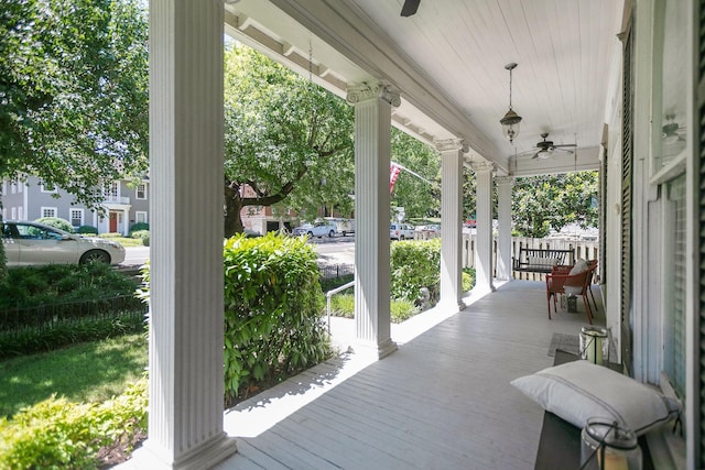712 W Main St, Franklin, TN 37064 - wooden porch with a ceiling fan
