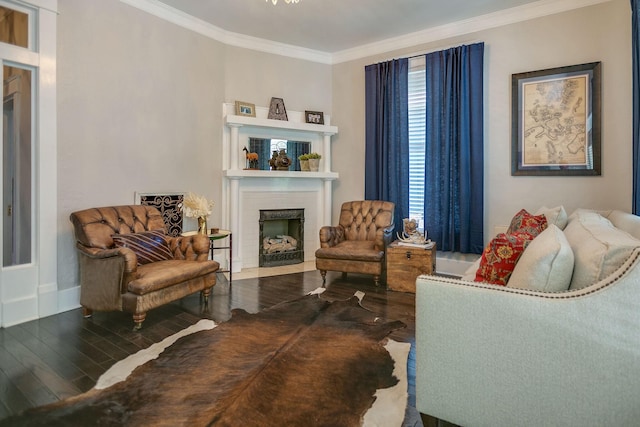 712 W Main St, Franklin, TN 37064 - living area with crown molding, wood finished floors, a fireplace, and baseboards