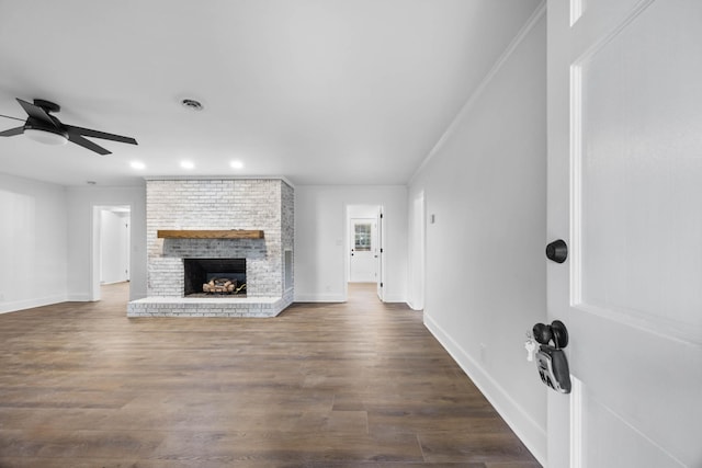176 Kirby Dr, Clarksville, TN 37042 - unfurnished living room featuring a ceiling fan, a fireplace, recessed lighting, dark wood-type flooring, and baseboards