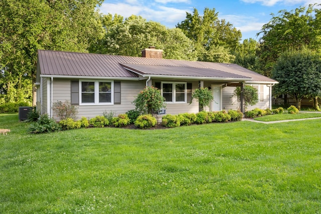 176 Kirby Dr, Clarksville, TN 37042 - ranch-style house with a chimney, a front lawn, and metal roof