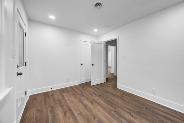 176 Kirby Dr, Clarksville, TN 37042 - unfurnished bedroom featuring dark wood-type flooring, baseboards, and recessed lighting