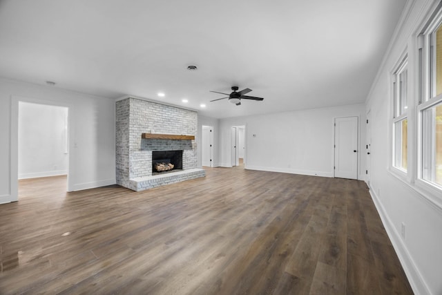 176 Kirby Dr, Clarksville, TN 37042 - unfurnished living room with a ceiling fan, a fireplace, baseboards, dark wood finished floors, and recessed lighting