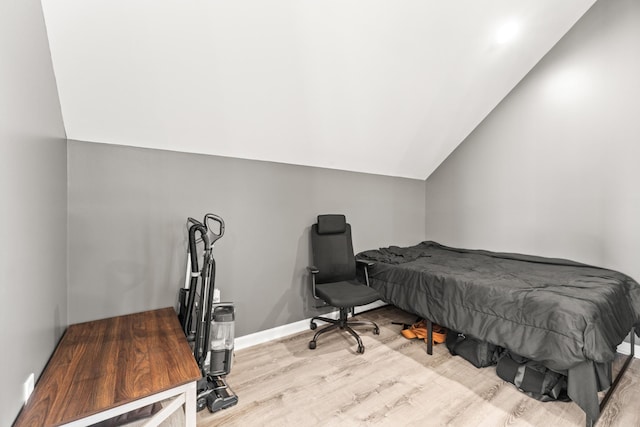 14 Lewter Rd, Taft, TN 38488 - bedroom featuring wood finished floors, lofted ceiling, and baseboards