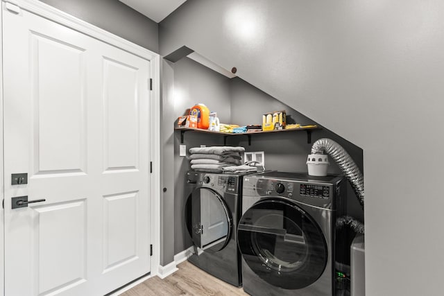 14 Lewter Rd, Taft, TN 38488 - washroom with washer and dryer and light wood-style flooring