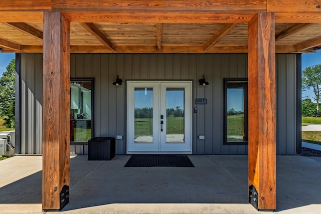 14 Lewter Rd, Taft, TN 38488 - doorway to property with french doors and board and batten siding