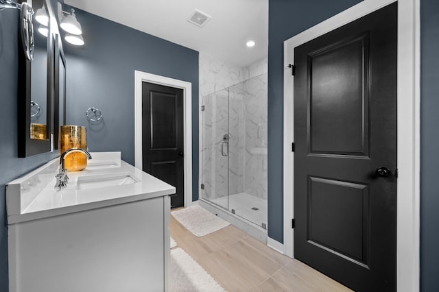 894 Plowson Rd, Mount Juliet, TN 37122 - bathroom with a marble finish shower, double vanity, and recessed lighting