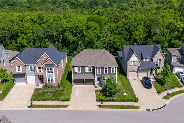 894 Plowson Rd, Mount Juliet, TN 37122 - aerial view of residential area with a heavily wooded area