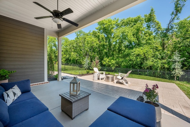894 Plowson Rd, Mount Juliet, TN 37122 - fenced backyard featuring an outdoor living space with a fire pit, a patio, ceiling fan, and view of wooded area