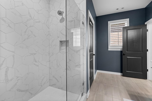 894 Plowson Rd, Mount Juliet, TN 37122 - full bathroom featuring a marble finish shower, baseboards, and tile patterned flooring