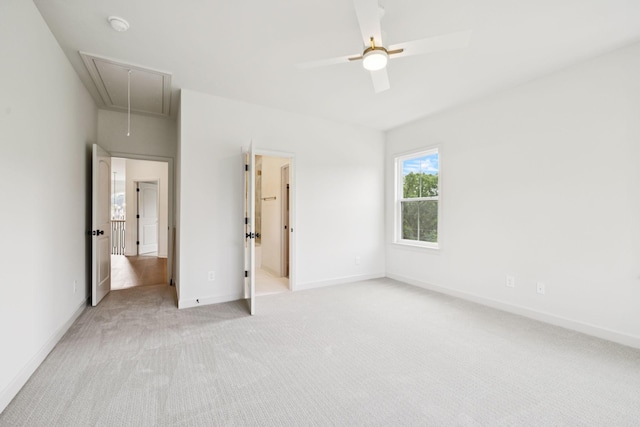 1001 Laguna Dr, Franklin, TN 37067 - unfurnished bedroom featuring attic access, light carpet, and ceiling fan