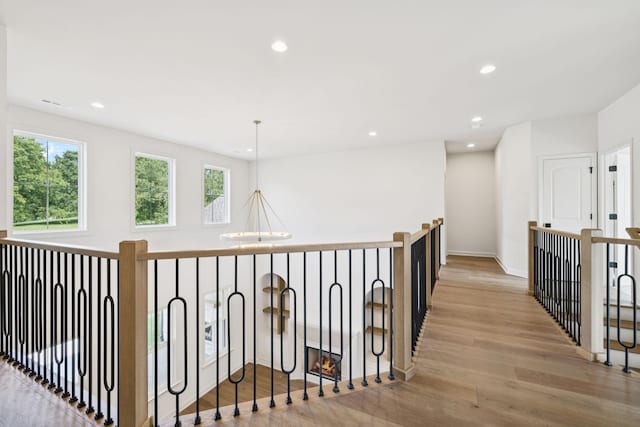 1001 Laguna Dr, Franklin, TN 37067 - corridor with light wood finished floors and recessed lighting