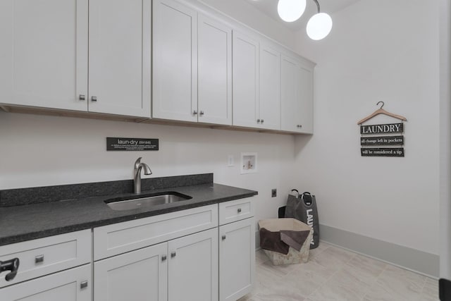 9906 Amarosa Ct, Brentwood, TN 37027 - laundry area with cabinet space, hookup for a washing machine, and hookup for an electric dryer