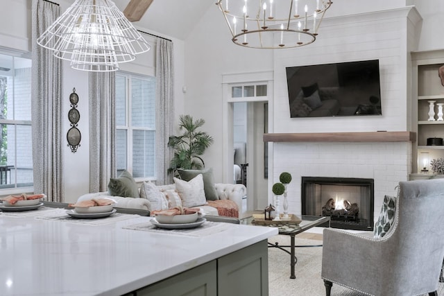 9906 Amarosa Ct, Brentwood, TN 37027 - living area featuring a chandelier, a large fireplace, and high vaulted ceiling