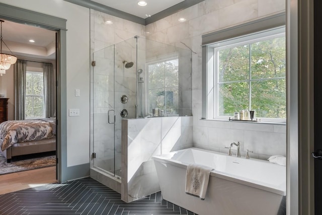 9906 Amarosa Ct, Brentwood, TN 37027 - ensuite bathroom featuring tile walls, a freestanding tub, and a stall shower