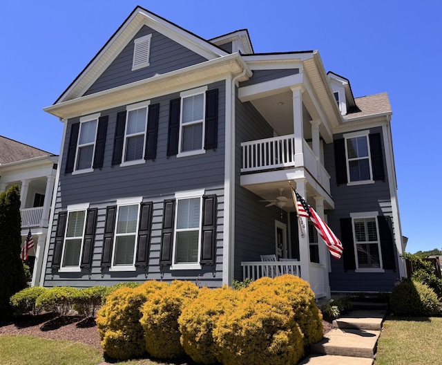 1344 Fairbanks St, Franklin, TN 37067 - view of front facade featuring a balcony, a ceiling fan, and covered porch