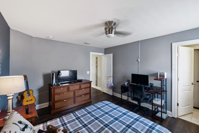 743 Burgess Dr, Goodlettsville, TN 37072 - bedroom with baseboards, wood finished floors, a ceiling fan, and a desk