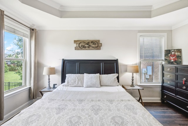 743 Burgess Dr, Goodlettsville, TN 37072 - bedroom featuring a tray ceiling, dark wood-type flooring, baseboards, and crown molding