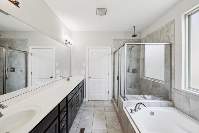 743 Burgess Dr, Goodlettsville, TN 37072 - full bath with a stall shower, double vanity, and a garden tub