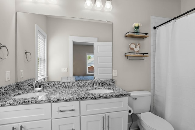 600 S Tunnel Rd, Gallatin, TN 37066 - bathroom with toilet, double vanity, and a shower with shower curtain