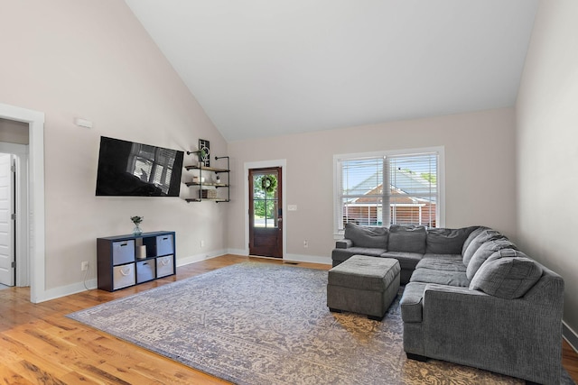 600 S Tunnel Rd, Gallatin, TN 37066 - living room with wood finished floors, baseboards, and high vaulted ceiling
