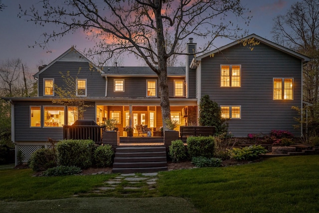 18 Whispering Pines Dr, Signal Mountain, TN 37377 - rear view of house featuring stairs, a chimney, and a lawn