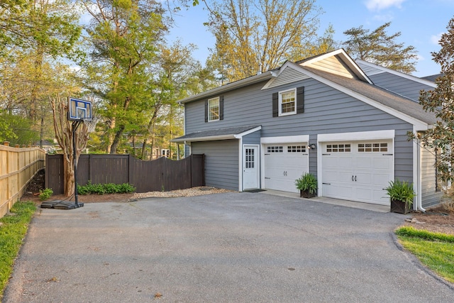 18 Whispering Pines Dr, Signal Mountain, TN 37377 - view of side of property with driveway and a garage