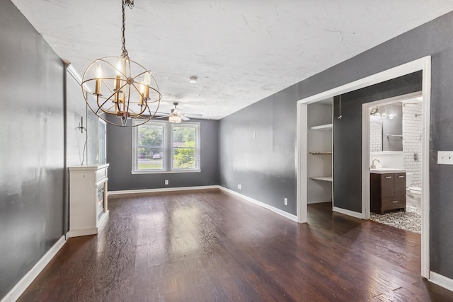 1903 Fern Dr Unit 1903-1905, Murfreesboro, TN 37130 - unfurnished dining area featuring dark wood-type flooring, a chandelier, built in shelves, a ceiling fan, and baseboards