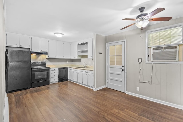 1903 Fern Dr Unit 1903-1905, Murfreesboro, TN 37130 - kitchen with black appliances, under cabinet range hood, open shelves, light countertops, and dark wood-style flooring