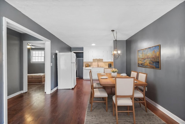 1903 Fern Dr Unit 1903-1905, Murfreesboro, TN 37130 - dining space with dark wood-type flooring, a chandelier, baseboards, and a ceiling fan