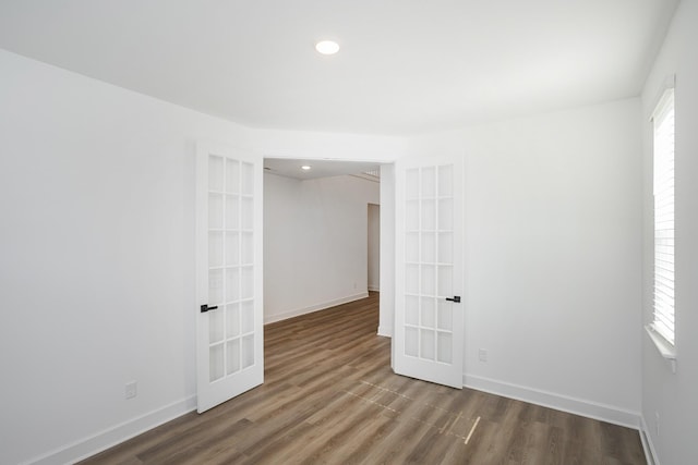 124 W Cassa Way, Mount Juliet, TN 37122 - unfurnished room with french doors, wood finished floors, baseboards, and recessed lighting