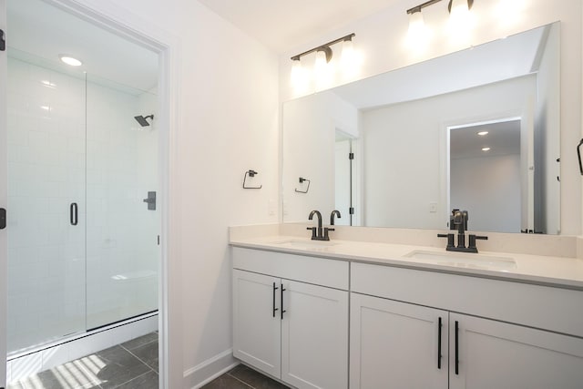 124 W Cassa Way, Mount Juliet, TN 37122 - bathroom featuring double vanity, a stall shower, baseboards, and recessed lighting
