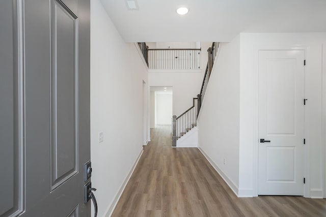 124 W Cassa Way, Mount Juliet, TN 37122 - hall featuring wood finished floors, stairs, and baseboards