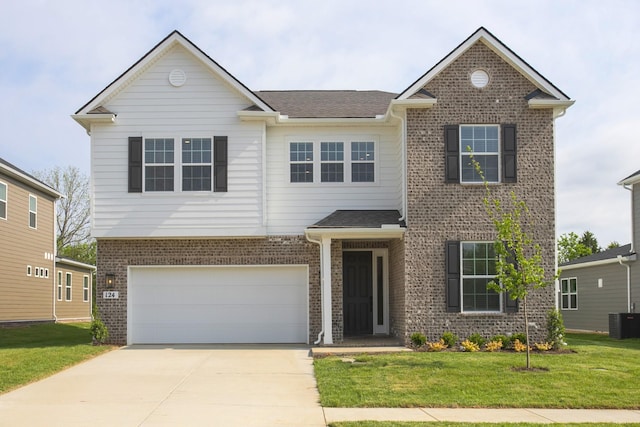 124 W Cassa Way, Mount Juliet, TN 37122 - view of front facade featuring central AC, brick siding, concrete driveway, an attached garage, and a front lawn