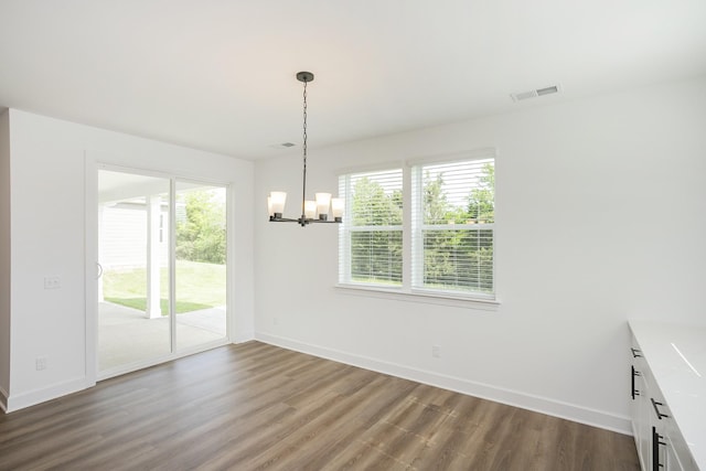 124 W Cassa Way, Mount Juliet, TN 37122 - unfurnished dining area with a chandelier, baseboards, and dark wood-style flooring