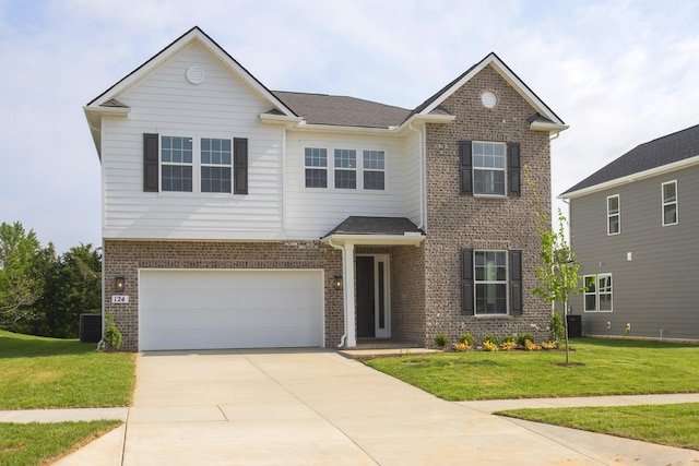 124 W Cassa Way, Mount Juliet, TN 37122 - view of front of home with brick siding, a garage, concrete driveway, and a front yard