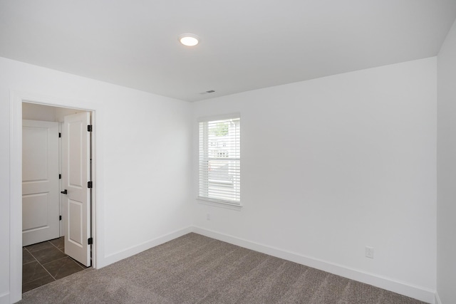 124 W Cassa Way, Mount Juliet, TN 37122 - unfurnished room featuring dark carpet, baseboards, and recessed lighting