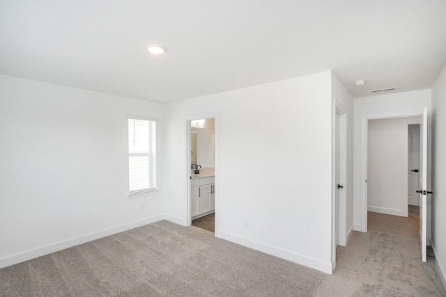 124 W Cassa Way, Mount Juliet, TN 37122 - spare room featuring light carpet, baseboards, a smoke detector, a sink, and recessed lighting