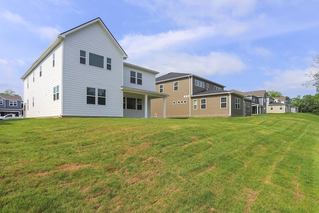 124 W Cassa Way, Mount Juliet, TN 37122 - rear view of house with a yard