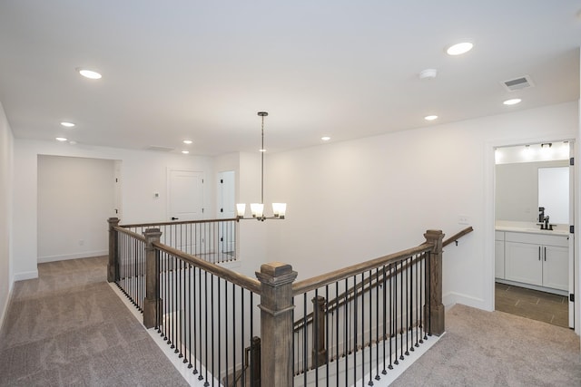 124 W Cassa Way, Mount Juliet, TN 37122 - corridor with an upstairs landing, carpet floors, recessed lighting, a chandelier, and baseboards