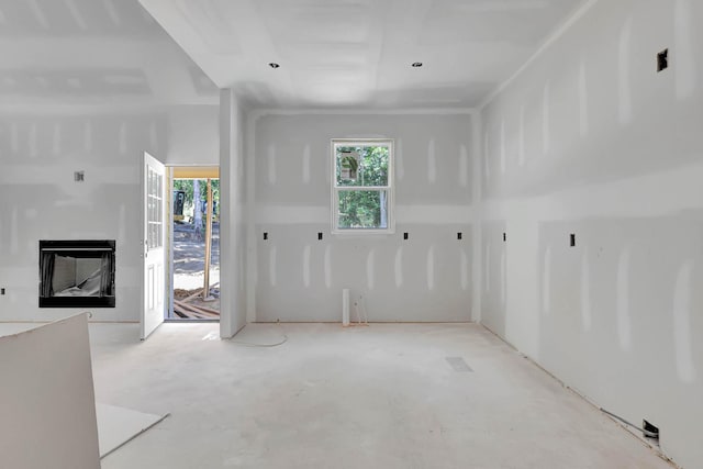7585 Peytons Rise Way Lot # 29, Georgetown, TN 37336 - unfurnished living room featuring a fireplace and concrete flooring