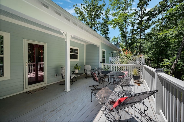 7112 Pepper Tree Cir, Fairview, TN 37062 - wooden deck with outdoor dining space
