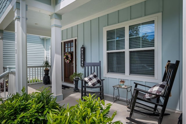 7112 Pepper Tree Cir, Fairview, TN 37062 - property entrance featuring covered porch and board and batten siding