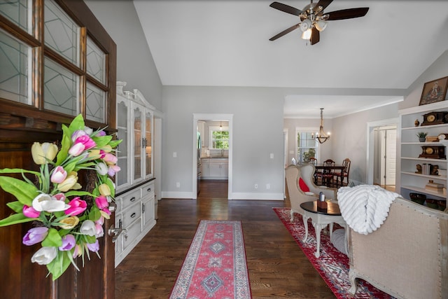 7112 Pepper Tree Cir, Fairview, TN 37062 - living area with vaulted ceiling, ceiling fan, a chandelier, dark wood-style floors, and baseboards