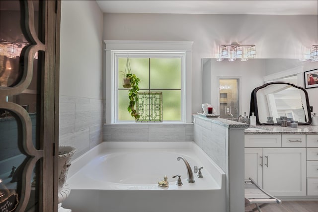 7112 Pepper Tree Cir, Fairview, TN 37062 - bathroom with vanity and a garden tub
