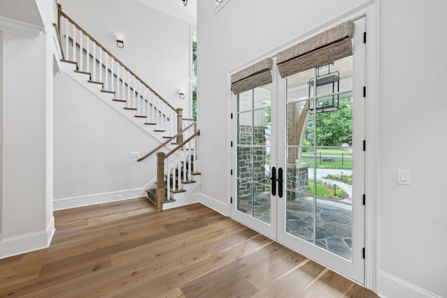 304 Berry Cir, Franklin, TN 37064 - doorway with wood finished floors, stairs, baseboards, and a high ceiling