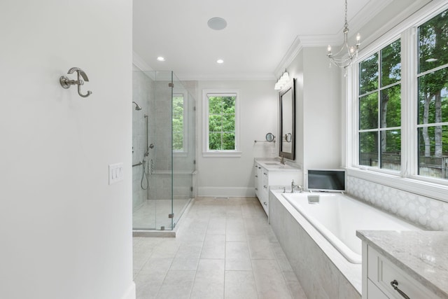 304 Berry Cir, Franklin, TN 37064 - bathroom with vanity, crown molding, a shower stall, a bath, and tile patterned flooring