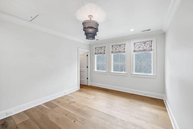 304 Berry Cir, Franklin, TN 37064 - spare room with ornamental molding, light wood finished floors, baseboards, a chandelier, and healthy amount of natural light