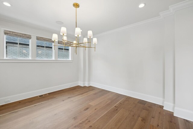 304 Berry Cir, Franklin, TN 37064 - empty room featuring baseboards, a chandelier, ornamental molding, wood finished floors, and recessed lighting