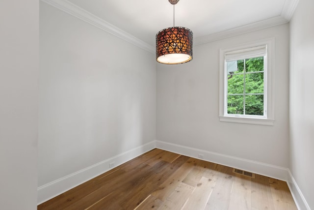 304 Berry Cir, Franklin, TN 37064 - empty room with baseboards, ornamental molding, and wood finished floors